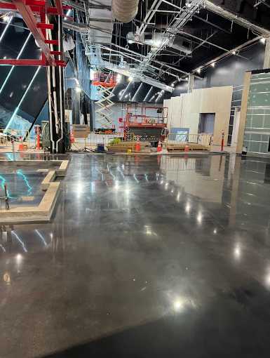 Polished concrete installation in progress at a large facility